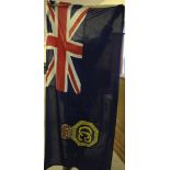 A vintage HM Coastguard blue ensign flag 81 x 178cm (2' 8" x 5' 10") with letter of provenance