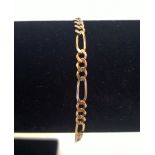 9ct Italian gold bracelet with long and short flat links. Approx length 19cm, weight approx 3.3g