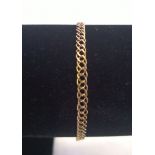 9ct gold double flat link bracelet. Length approx 19cm, weight approx 2.5g