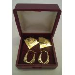 2 pairs of 9ct gold earrings - one pair are small hoop earrings and the other are an Art Deco fan