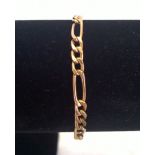 A hallmarked 9ct gold long and short link bracelet. Length approx 19cm, weight approx 2.6g