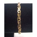 A 9ct gold fancy link bracelet. Length approx 19cm, weight approx 5g.