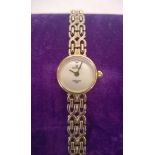 Ladies hallmarked gold watch with 9ct gold case and bracelet strap. Maker Sovereign. Total weight