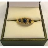 Hallmarked 9ct gold diamond and sapphire ring. Size S, total weight approx 2.7g