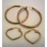 2 pairs of 9ct gold earrings - one pair are heart shaped with a textured finish, and the other are