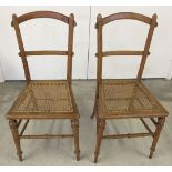 A pair of cane seated bedroom/hall chairs