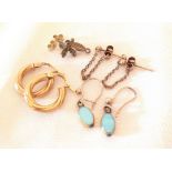 3 pairs of 9ct gold earrings with a 9ct gold charm. Approx 3.6g total weight