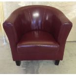 A red leather bucket chair