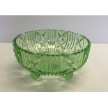 Large green pressed glass fruit bowl with feet. 24cm diameter