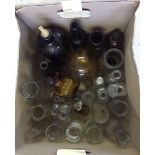 A box of clear and brown glass bottles to include vintage milk bottles.