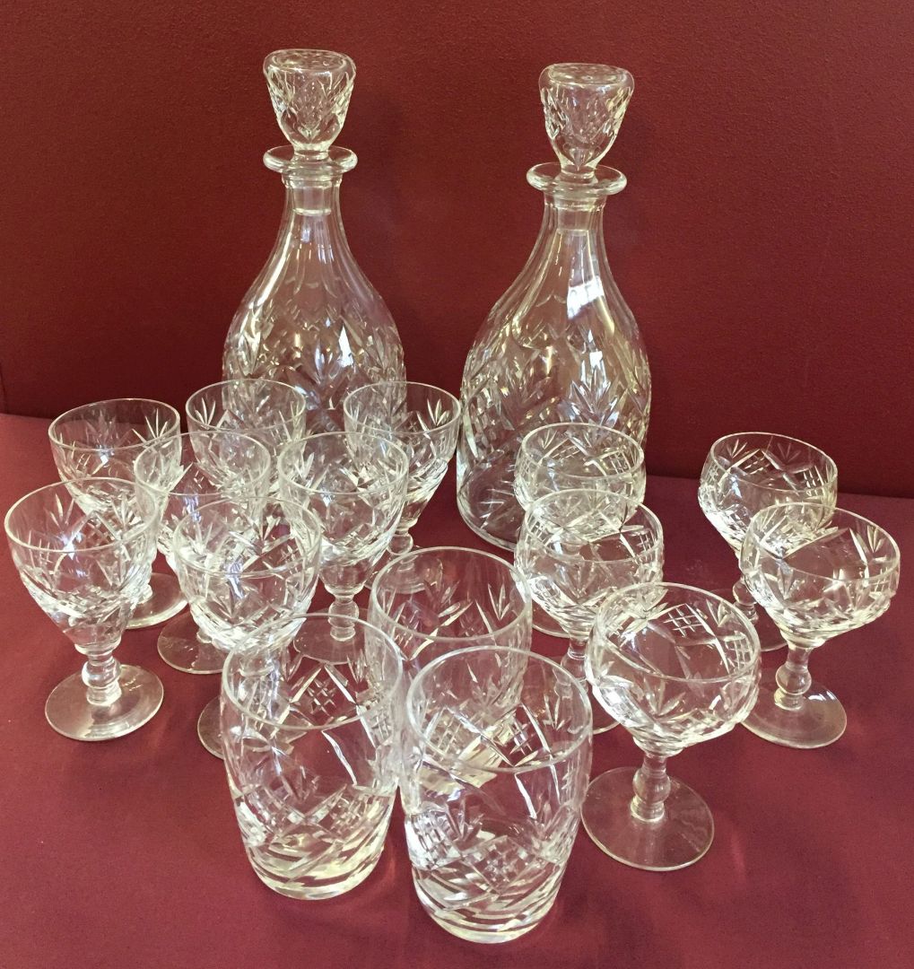 Two crystal decanters with selection of matching glasses, one a/f. Stamped Webb Corbett.