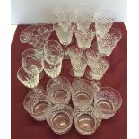 A collection of cut crystal, comprising 6 Waterford whisky tumblers, 6 Waterford wine glass, 4