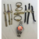 A quantity of vintage and modern ladies watches together with an England Rugby gents watch