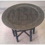 A Persian table with brass tray top 45cm high 50 cm tray diameter