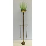 Converted brass lamp with glass light shade