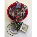 A tub of assorted costume jewellery