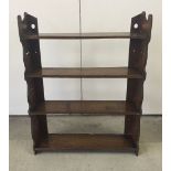 A vintage oak 4 shelf wall unit