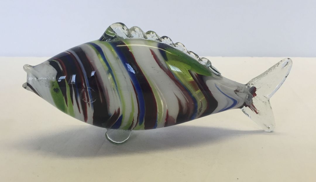 A small multicoloured Murano glass fish, approx 23cm long. In shades of green, red, blue and white