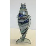 A multicloured Murano glass fish in shades of red, blue, yellow and white, with 3 way tail. Approx