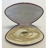 A cased set of Rosita 3 strand faux pearls