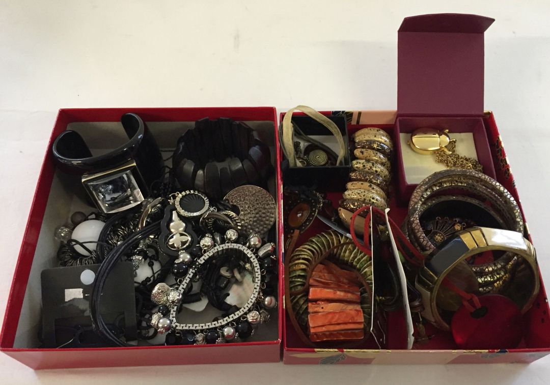 2 trays of quality costume jewellery. One in monochrome designs including necklaces, bangles &