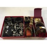 2 trays of quality costume jewellery. One in monochrome designs including necklaces, bangles &