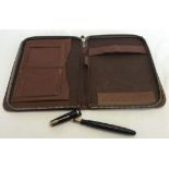 A 1948 Parker Duofold fountain pen with 14ct gold nib together with a brown leather writing case