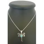 A dragonfly pendant of 925 silver set with an Amazonite cabochon on a rope chain