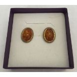 9ct gold hallmarked earrings set with amber