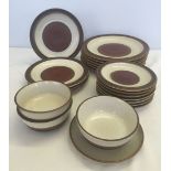 A quantity of Denby dinnerware comprising 6 dinner plates, 4 breakfast plates, 7 sideplates, 2 bowls