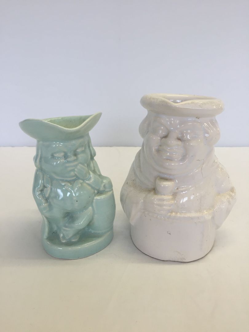 A Dartmouth pottery "Friar" toby jug together with a Burlington ware toby jug.