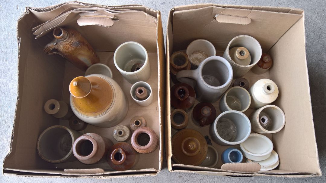 2 boxes of stoneware jars and bottles.