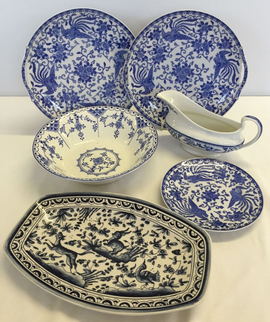 A quantity of blue and white china to include 3 Noritake plates with bird design