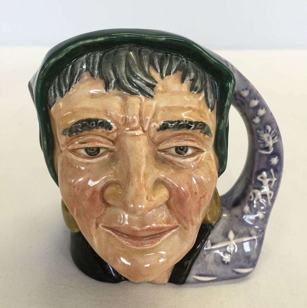 A Royal Doulton Toby jug - The fortune teller.
