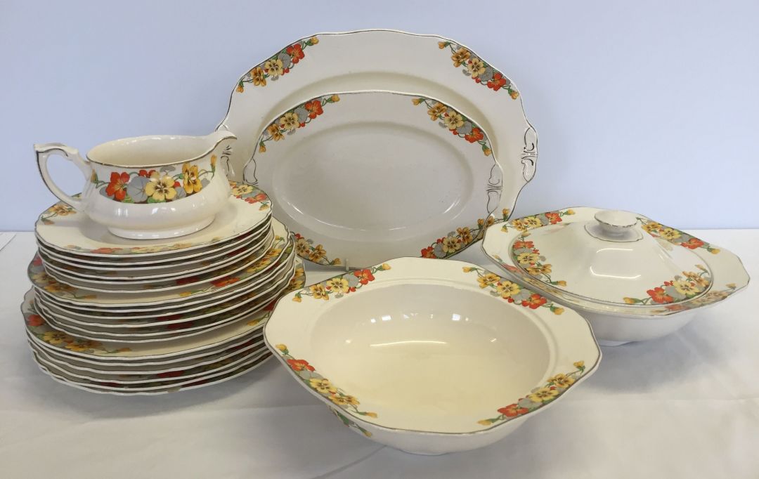 A quantity of Alfred Meakin " Trio " dinner ware comprising- 2 serving plate, 2 tureen 1 with lid,