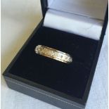 A 9ct gold and diamond full eternity ring. Size Q, weight approx 3.5g
