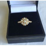 A 9ct gold dress ring set with 7 seed pearls, 3 pearls have some wear. Size I 1/2, weight approx 2.