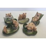 A collection of early 20th century Pig ornaments by H & S L to include a matchstriker. 2 with