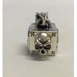 A silver Thierry Martino designer Soul Fetish ' Devils Dice' pendant set with 2 garnets.