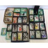 A collection of 31 jewellery sets with glass and gemstone beads.