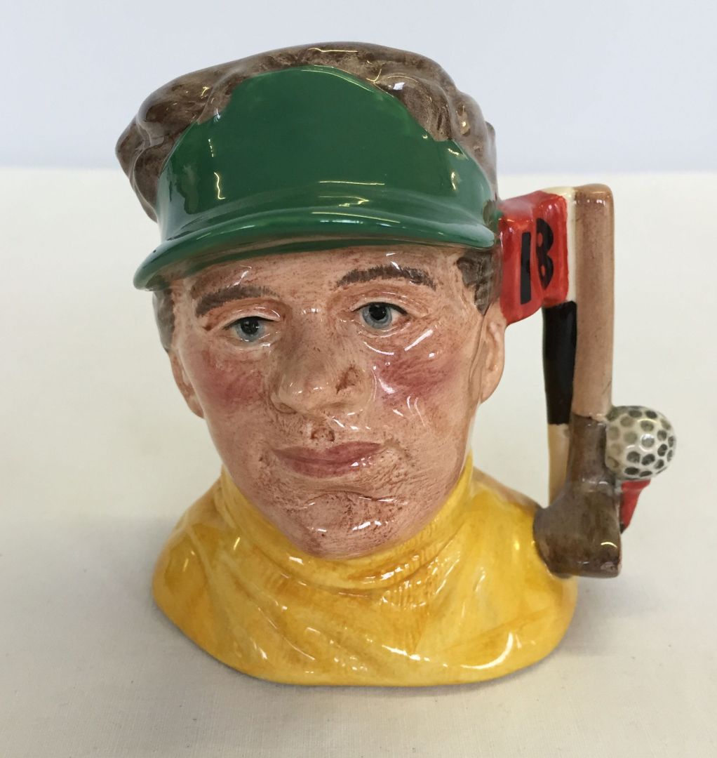 A royal Doulton toby jug - The Golfer