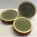 12 green Denby plates comprising 6 dinner plates and 6 side plates.