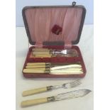 A boxed set of bone handled plated fish knives and forks.