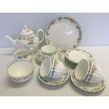 A Royal Worcester English Garden part tea set comprising; teapot, sandwich plate, milk jug, sugar