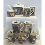 Lesley's cats tea set comprising teapot, sugar bowl, milk jug and 6 mugs, all with cat decoration.