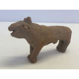 A Sudanese pottery Lion. 15cm long approx.