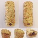 An antique Chinese carved ivory handle. Carving depicts figures writing (believed to be Jesuit