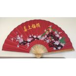 A large canvas and bamboo fan with Peacock decoration, approx 88cm high