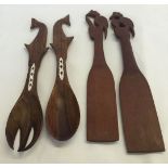 4 carved wooden South Pacific spoons, 2 with mother of pearl inlay from the Soloman Islands, and 2