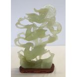 A large jade carving of 3 deer, 30cm tall (exc wooden base)